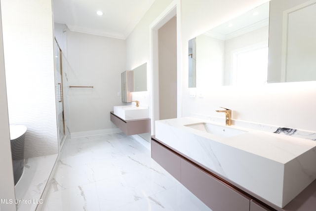 bathroom with a shower with door, vanity, and ornamental molding