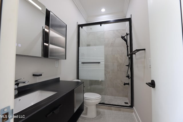 bathroom featuring vanity, ornamental molding, toilet, and walk in shower