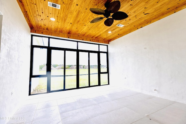138 Genoa Dr, Madison, MS 39110 - unfurnished room with wood ceiling, ceiling fan, tile patterned floors, and a water view