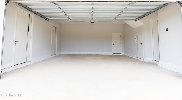 138 Genoa Dr, Madison, MS 39110 - garage featuring a garage door opener