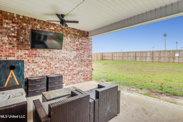 view of patio with ceiling fan