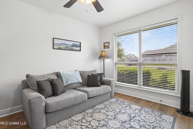 13703 Windwood Dr, Gulfport, MS 39503 - living room featuring ceiling fan, baseboards, and wood finished floors
