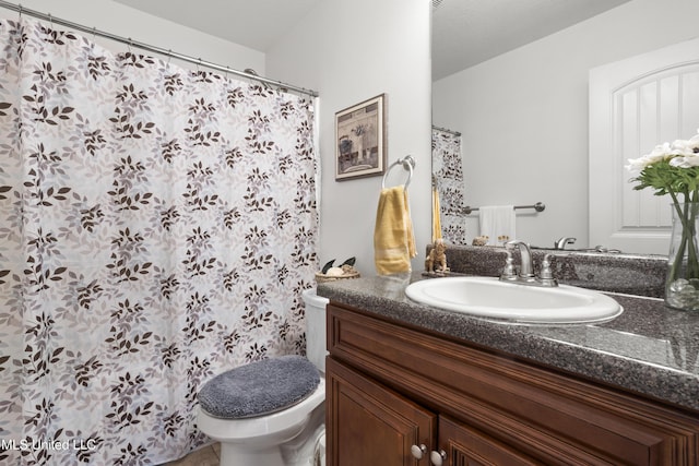 13703 Windwood Dr, Gulfport, MS 39503 - full bathroom featuring toilet, vanity, and a shower with curtain