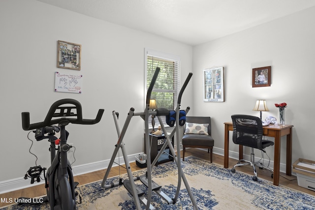 13703 Windwood Dr, Gulfport, MS 39503 - exercise area with baseboards and wood finished floors
