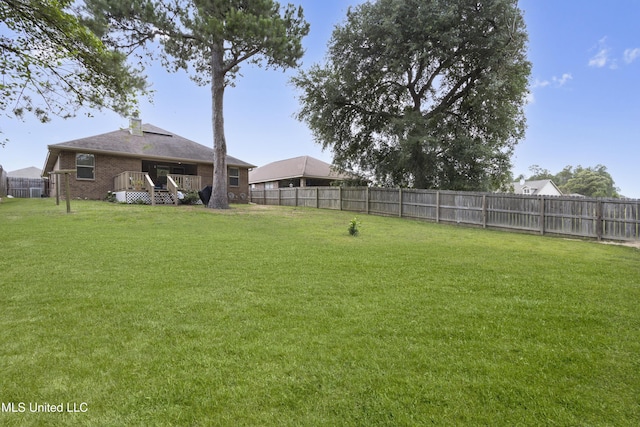 13703 Windwood Dr, Gulfport, MS 39503 - view of yard featuring a wooden deck