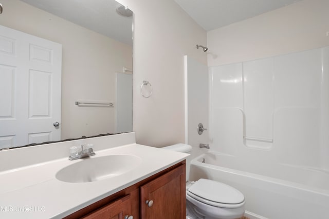 full bathroom featuring vanity, toilet, bathtub / shower combination, and a textured ceiling