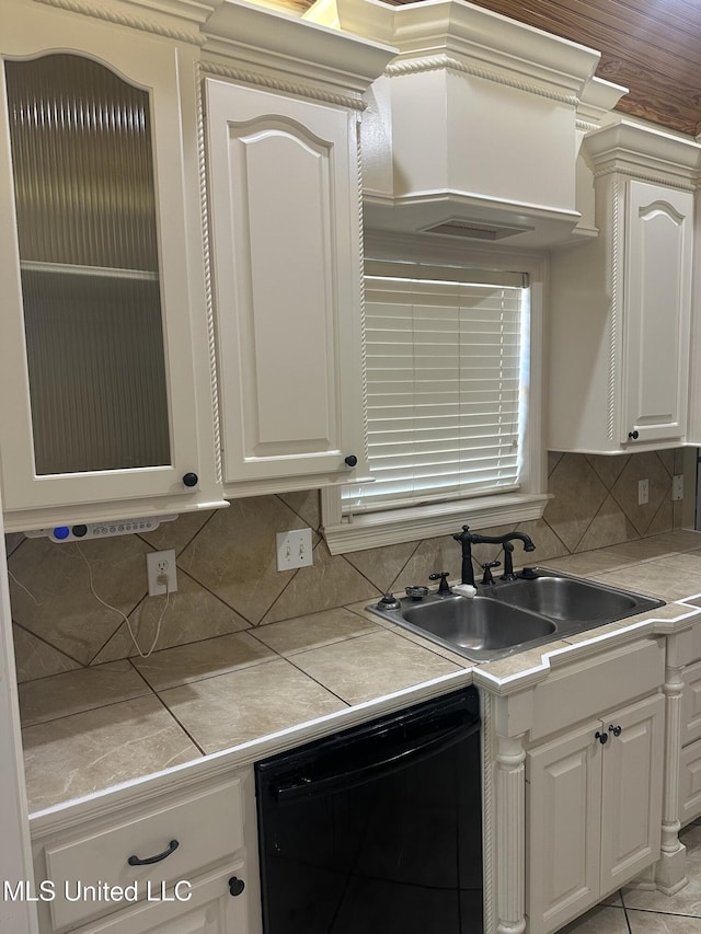 423 Grant Fox Dr, Brandon, MS 39047 - kitchen with dishwasher, a sink, backsplash, tile countertops, and white cabinetry