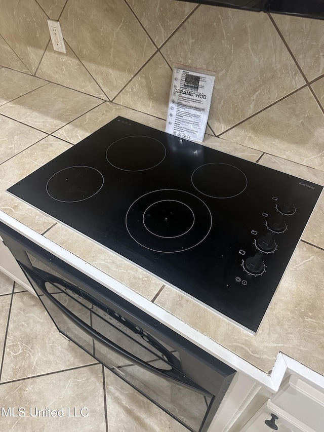 423 Grant Fox Dr, Brandon, MS 39047 - kitchen view of black electric cooktop