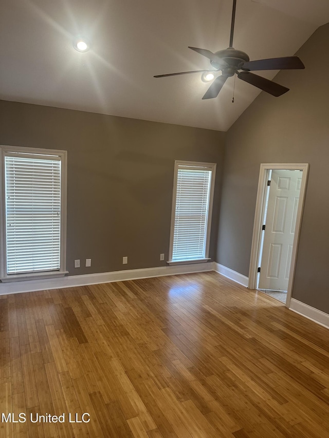 423 Grant Fox Dr, Brandon, MS 39047 - empty room with a ceiling fan, lofted ceiling, wood finished floors, and baseboards