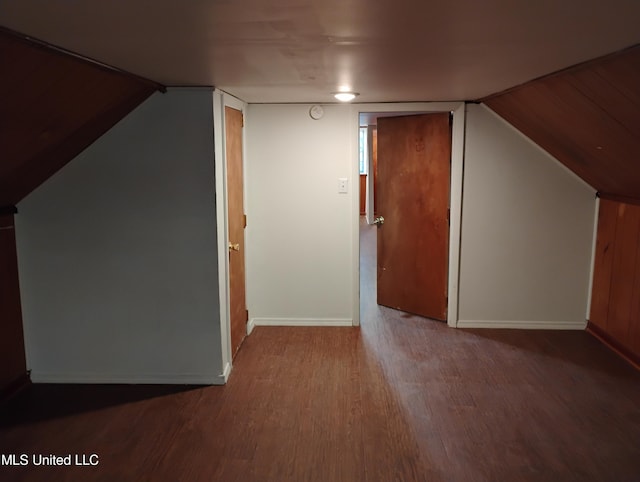 bonus room featuring wood-type flooring and lofted ceiling