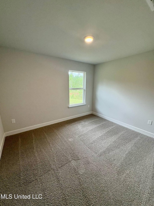 18052 Tiffany Renee Dr, Gulfport, MS 39503 - carpeted empty room with baseboards