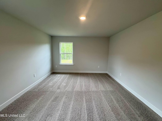 18052 Tiffany Renee Dr, Gulfport, MS 39503 - spare room with baseboards and carpet