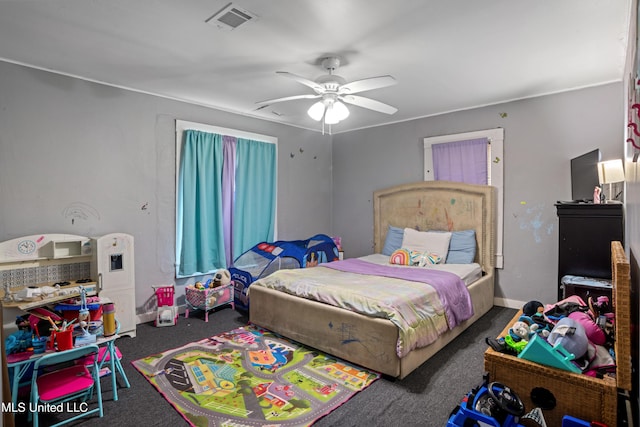 bedroom featuring a ceiling fan, carpet flooring, and visible vents