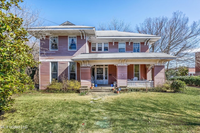 italianate-style house featuring a front lawn and a porch