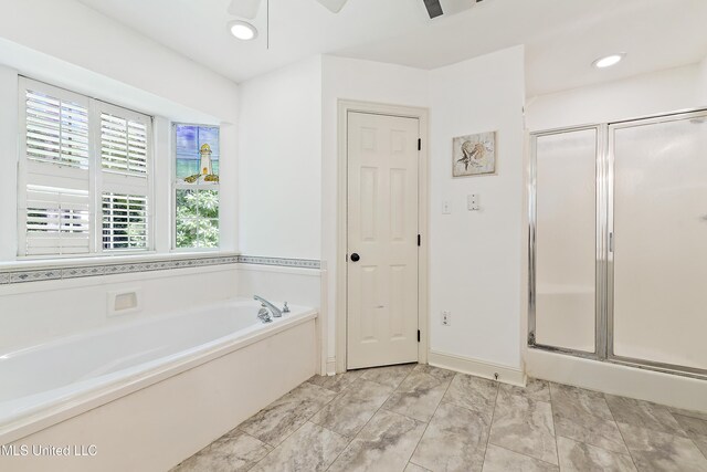 7635 Fairway Dr, Diamondhead, MS 39525 - full bathroom featuring a bath, a shower stall, and recessed lighting