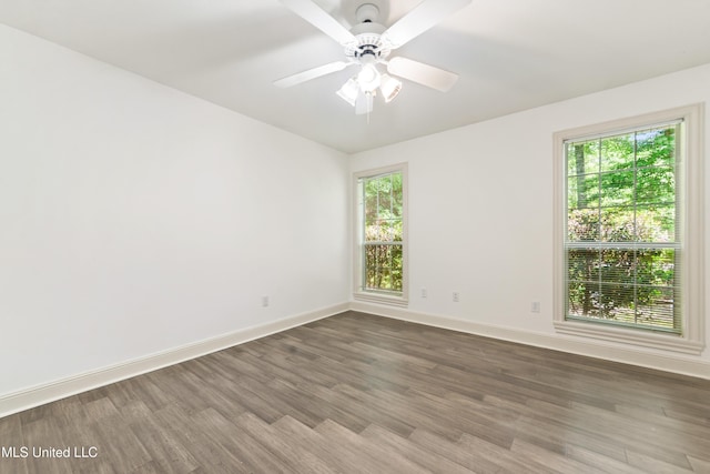 7635 Fairway Dr, Diamondhead, MS 39525 - unfurnished room with wood finished floors, baseboards, and ceiling fan