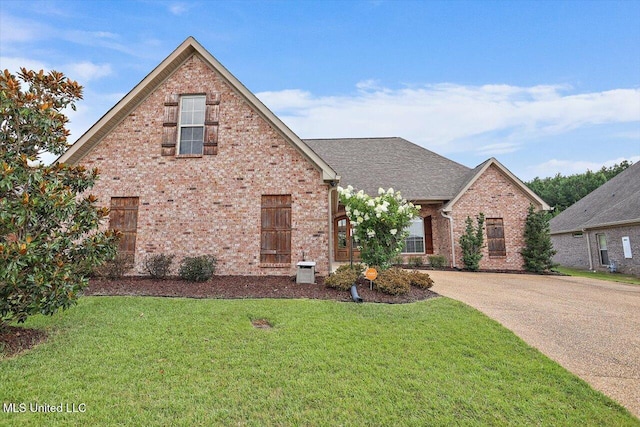 244 Hidden Hills Pkwy, Brandon, MS 39047 - view of front of property featuring brick siding and a front lawn