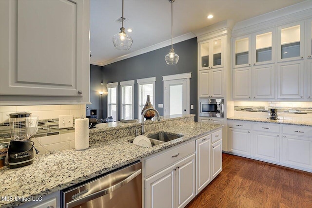 244 Hidden Hills Pkwy, Brandon, MS 39047 - kitchen featuring appliances with stainless steel finishes, tasteful backsplash, white cabinets, crown molding, and glass insert cabinets