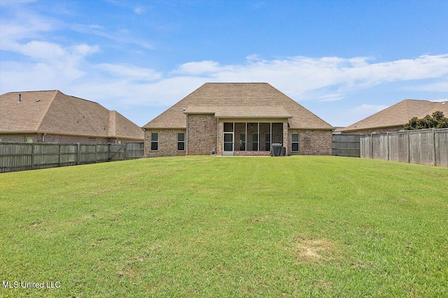 244 Hidden Hills Pkwy, Brandon, MS 39047 - rear view of property with brick siding, a fenced backyard, and a sunroom