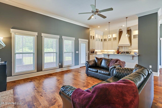 244 Hidden Hills Pkwy, Brandon, MS 39047 - living area with ceiling fan, dark wood-style floors, ornamental molding, and recessed lighting