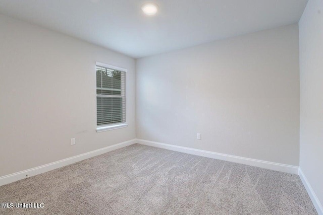 view of carpeted spare room