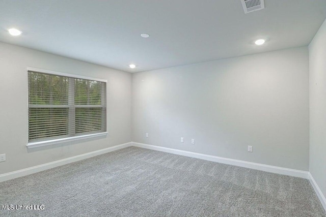 view of carpeted spare room