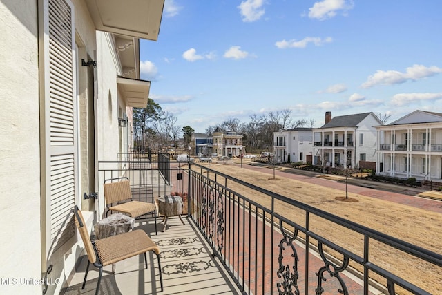 balcony featuring a residential view