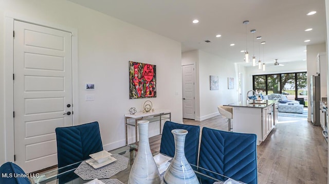132 Markham Dr, Gulfport, MS 39507 - dining room with recessed lighting, light wood-type flooring, baseboards, and a ceiling fan