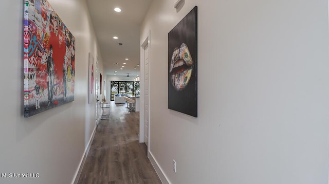 132 Markham Dr, Gulfport, MS 39507 - hall featuring recessed lighting, wood finished floors, and baseboards