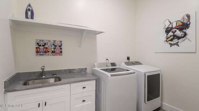 132 Markham Dr, Gulfport, MS 39507 - washroom with separate washer and dryer and cabinet space