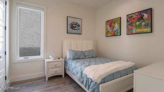 132 Markham Dr, Gulfport, MS 39507 - bedroom featuring wood finished floors and baseboards