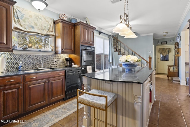 kitchen with a kitchen breakfast bar, a center island, ornamental molding, and black dishwasher