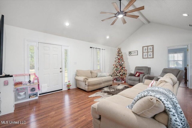 living room featuring beamed ceiling, ceiling fan, high vaulted ceiling, and hardwood / wood-style floors