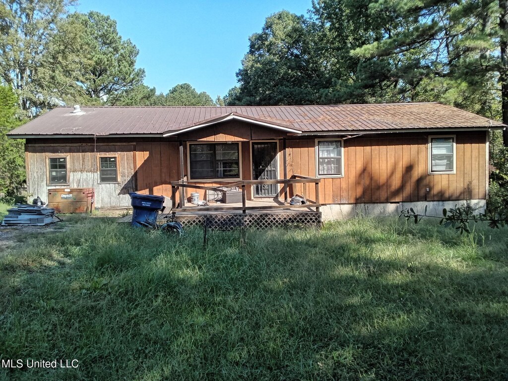 373 John Branch Rd, Batesville, MS 38606 - back of property featuring metal roof and a wooden deck