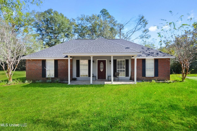 single story home with a porch and a front lawn