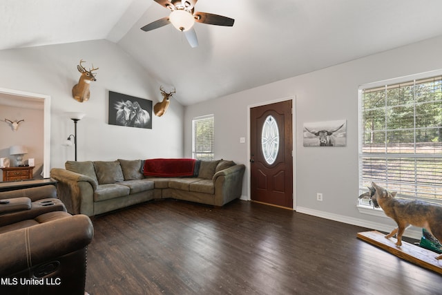 living room with ceiling fan, dark hardwood / wood-style floors, and vaulted ceiling