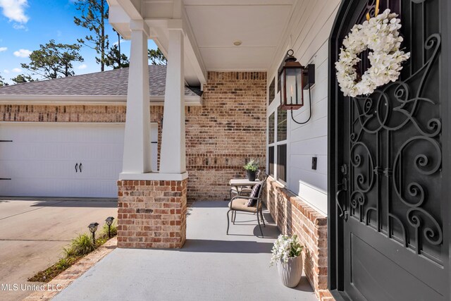 12578 Alphabet Rd, Gulfport, MS 39503 - covered porch featuring an attached garage
