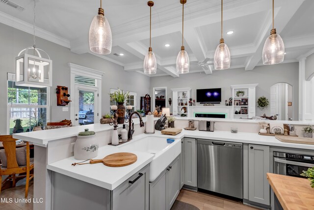 12578 Alphabet Rd, Gulfport, MS 39503 - kitchen with appliances with stainless steel finishes, gray cabinets, open floor plan, coffered ceiling, and a sink