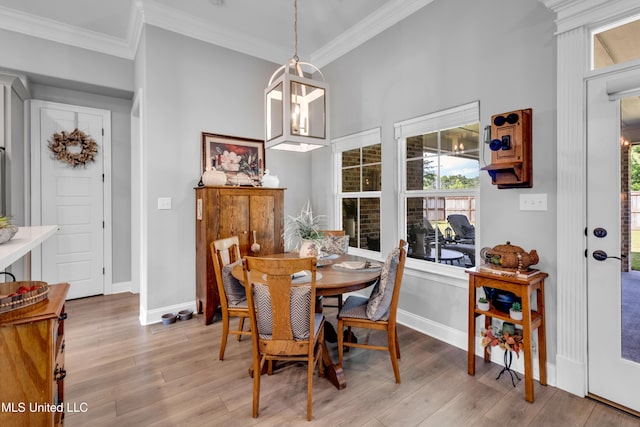 12578 Alphabet Rd, Gulfport, MS 39503 - dining area with wood finished floors, crown molding, and baseboards