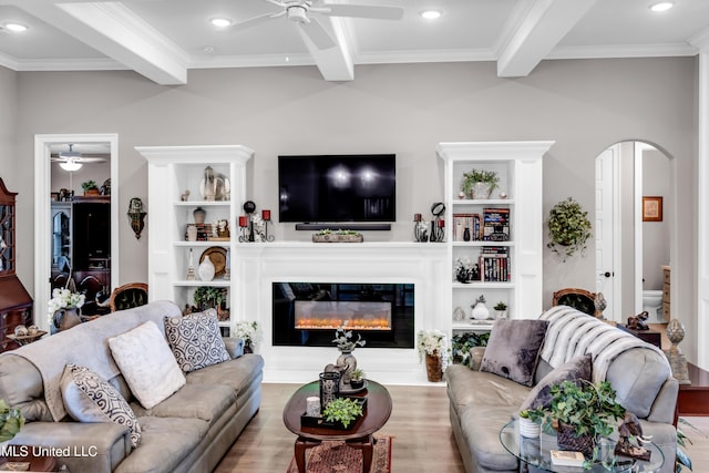 12578 Alphabet Rd, Gulfport, MS 39503 - living area featuring ceiling fan, arched walkways, ornamental molding, beam ceiling, and recessed lighting
