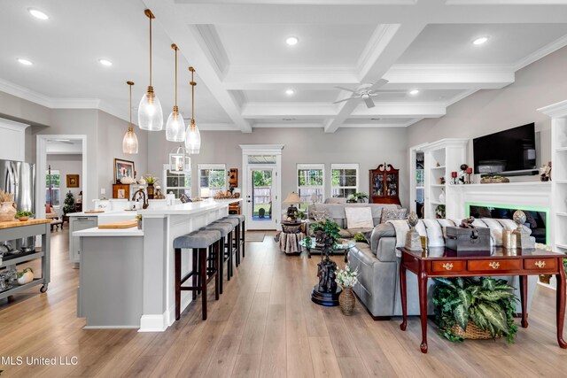 12578 Alphabet Rd, Gulfport, MS 39503 - living room featuring a ceiling fan, recessed lighting, beamed ceiling, coffered ceiling, and light wood finished floors