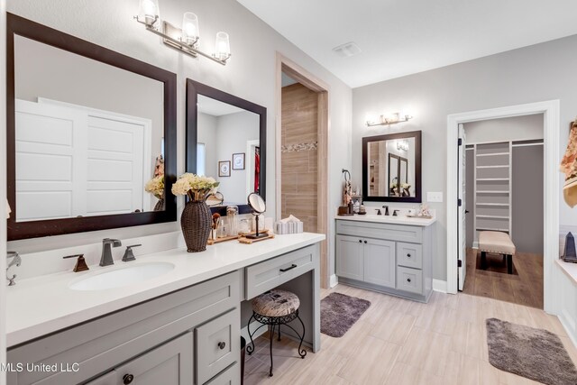 12578 Alphabet Rd, Gulfport, MS 39503 - full bathroom featuring vanity and a walk in closet
