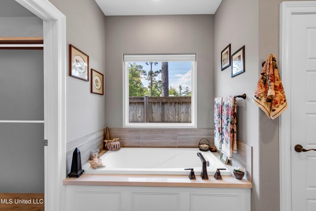 12578 Alphabet Rd, Gulfport, MS 39503 - bathroom with a bath