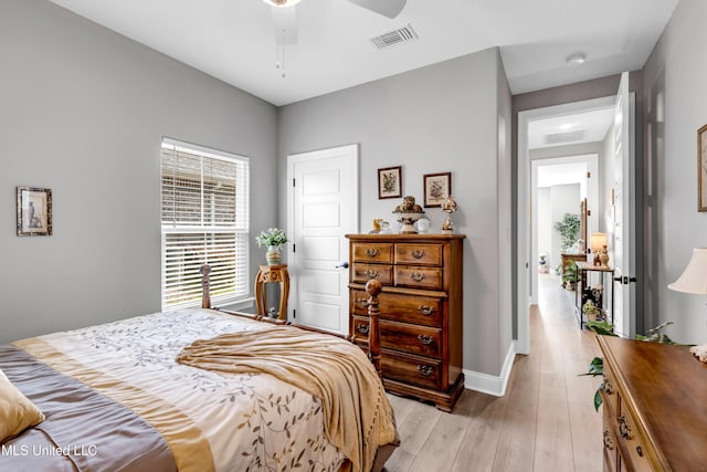 12578 Alphabet Rd, Gulfport, MS 39503 - bedroom with light wood-type flooring, baseboards, and ceiling fan