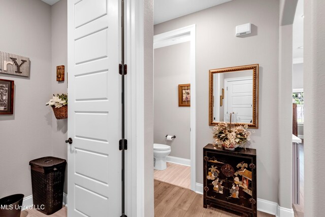 12578 Alphabet Rd, Gulfport, MS 39503 - hallway with light wood-type flooring and baseboards