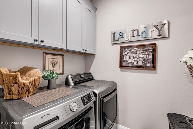 12578 Alphabet Rd, Gulfport, MS 39503 - laundry room with cabinet space and washer and dryer