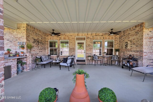 12578 Alphabet Rd, Gulfport, MS 39503 - view of patio / terrace with a ceiling fan and an outdoor living space