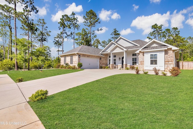12578 Alphabet Rd, Gulfport, MS 39503 - craftsman-style home featuring concrete driveway, brick siding, a garage, roof with shingles, and covered porch