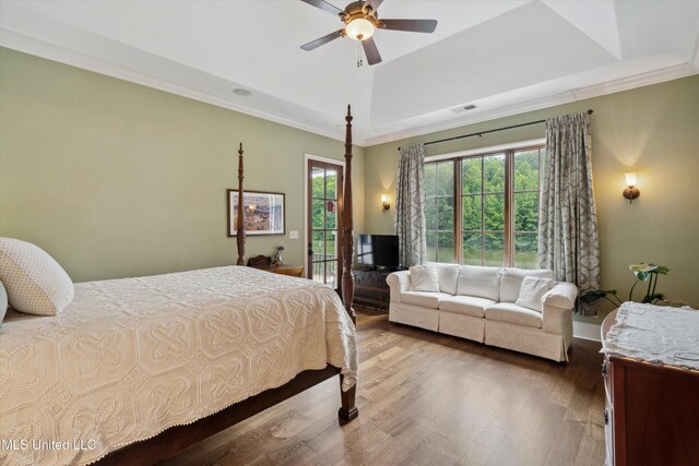4666 Eiffel Ln, Nesbit, MS 38651 - bedroom with a tray ceiling, wood finished floors, access to outside, crown molding, and ceiling fan