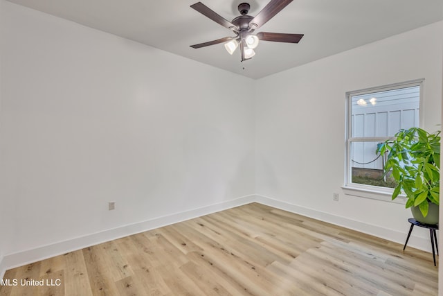 unfurnished room with ceiling fan and light wood-type flooring